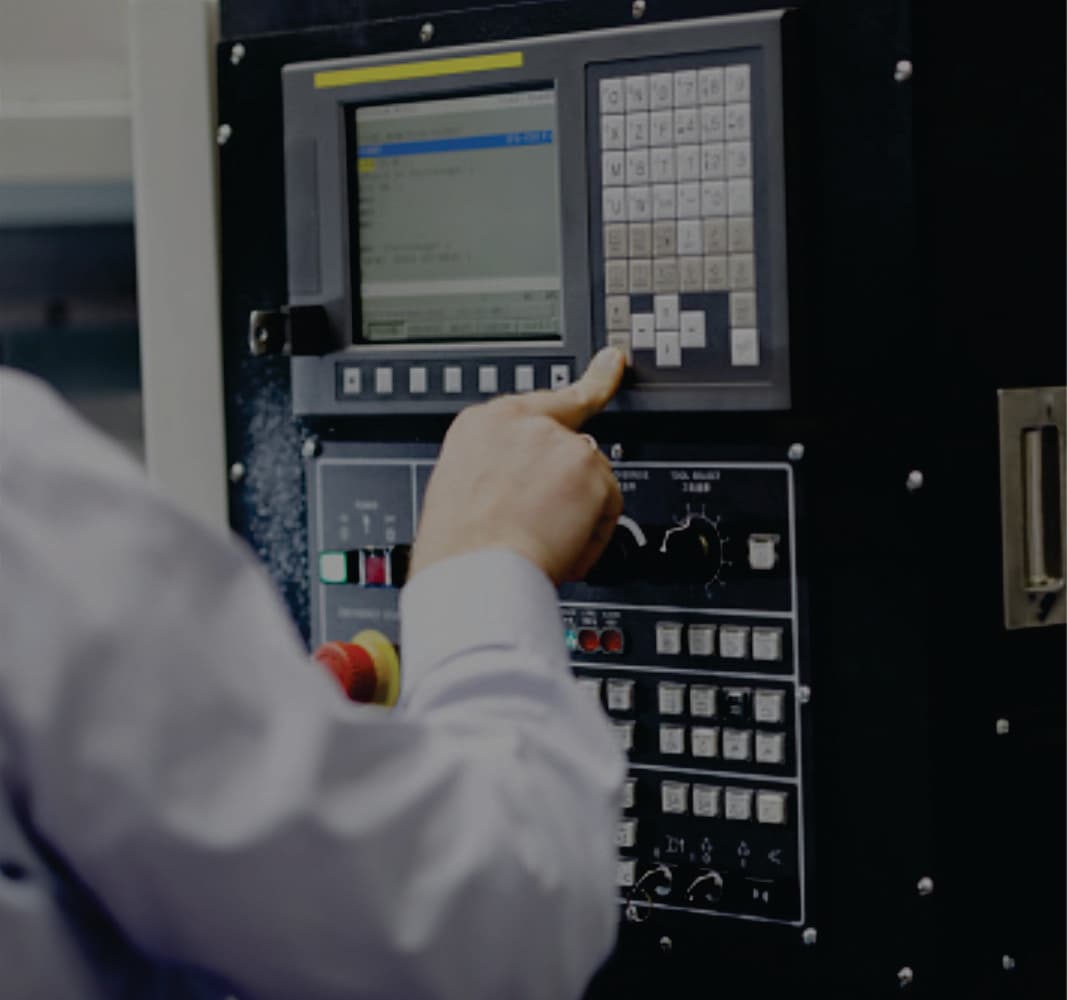Industrial controller with operator finger pressing button